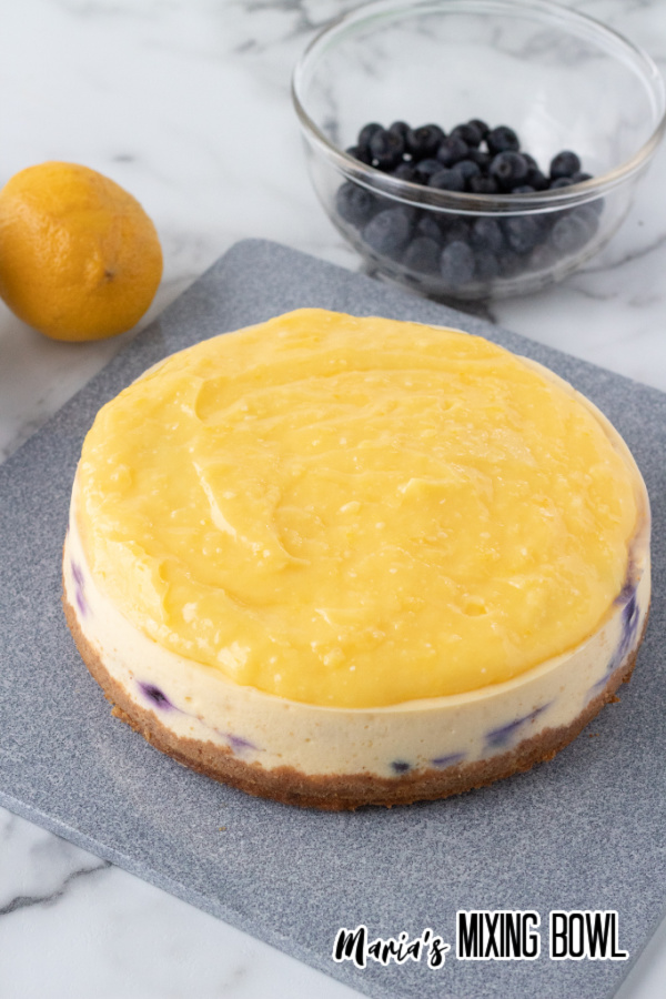Instant pot lemon blueberry cheesecake topped with lemon topping