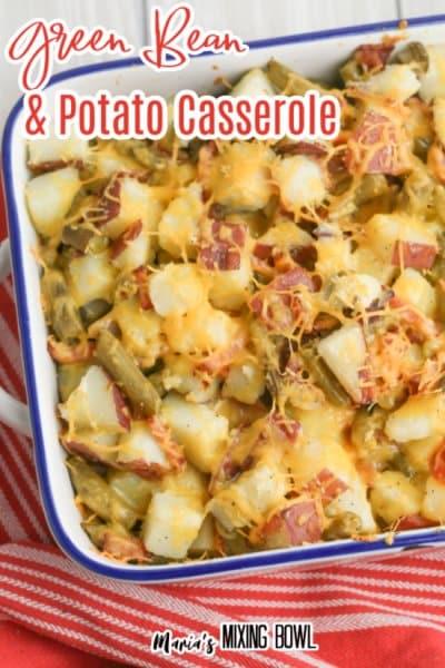 Green Bean and Potato Casserole in white baking pan red and white napkin