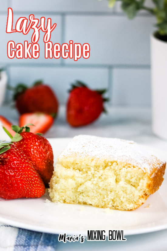 Lazy Cake Recipe on white plate with strawberries