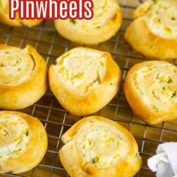 Jalapeno Popper Pinwheels on cooling rack and board