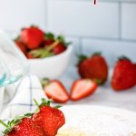 Lazy Cake Recipe on white plate with strawberries