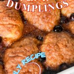close up of blueberry dumplings in a baking dish with text for pinterst
