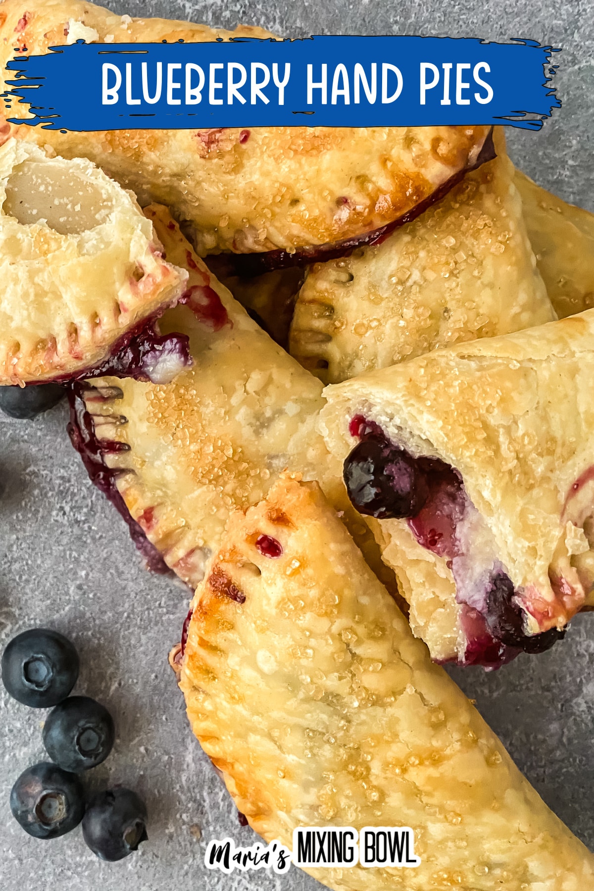 beluberry hand pies stacked on a dark background with the name in blue for pinterst