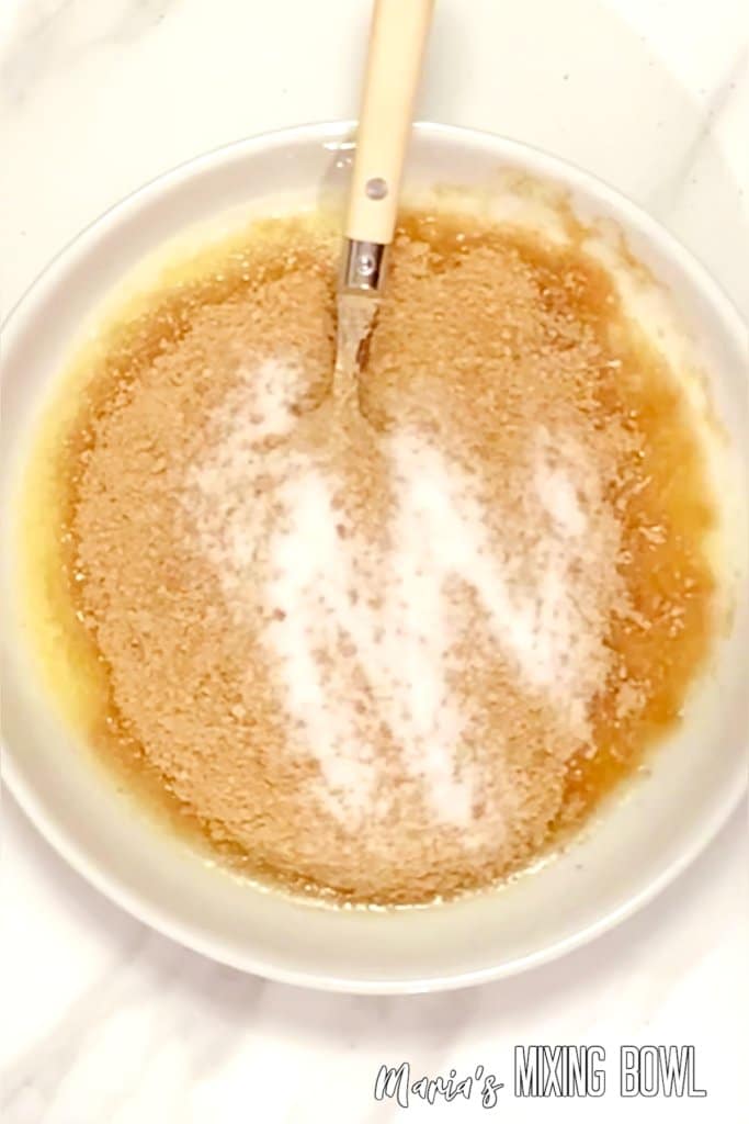graham cracker crumbs, sugar, and melted butter in a bowl