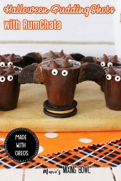 Halloween Pudding Shots with Rumchata on a wooden board