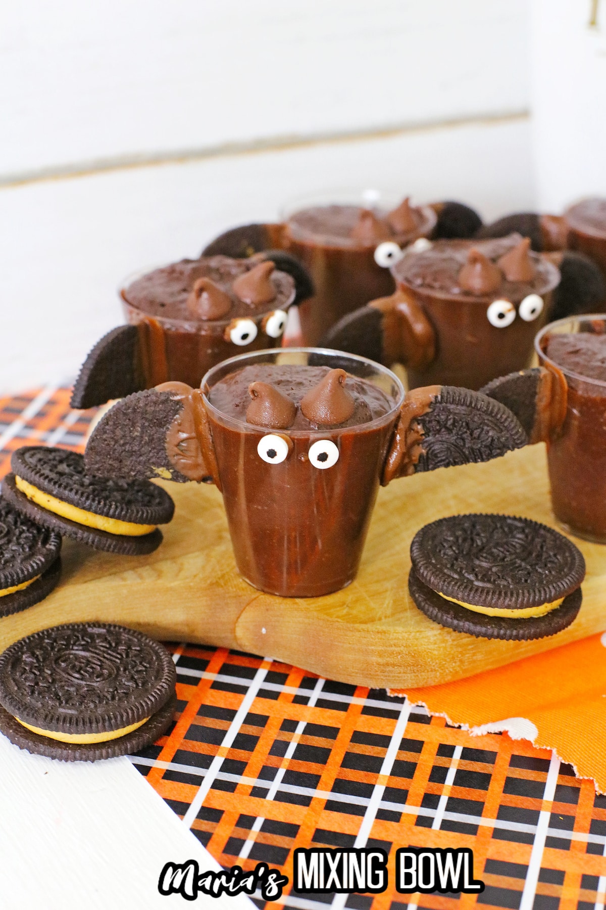 Halloween Pudding Shots with Rumchata on a wooden board