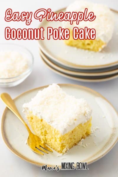 slice of pineapple coconut poke cake on a white and gold plate