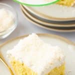 slice of pineapple coconut poke cake on a white and gold plate for pitnerest