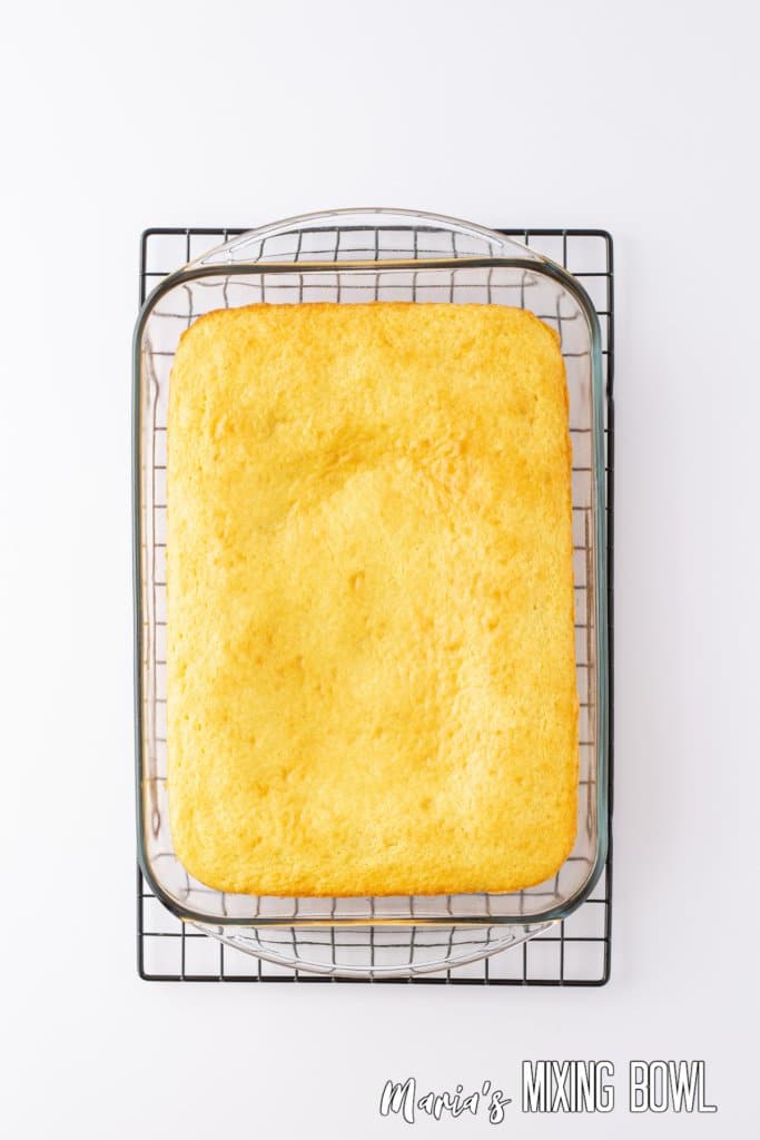 baked dessert in glass baking dish cooling