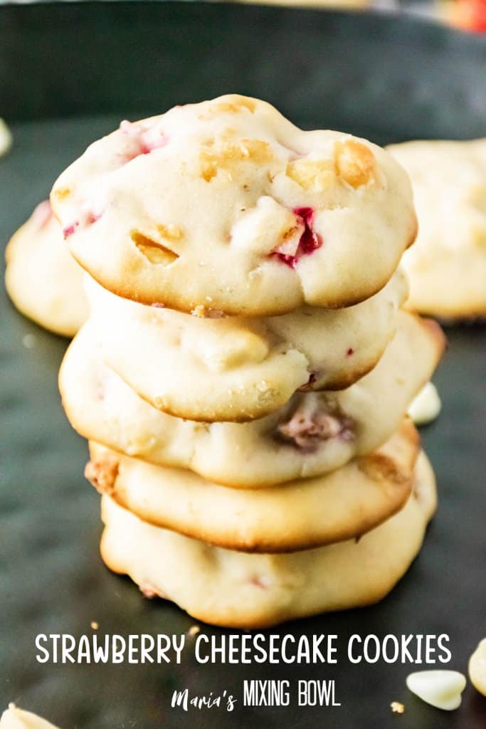 stack of strawberry cheesecake cookies on a dark plate