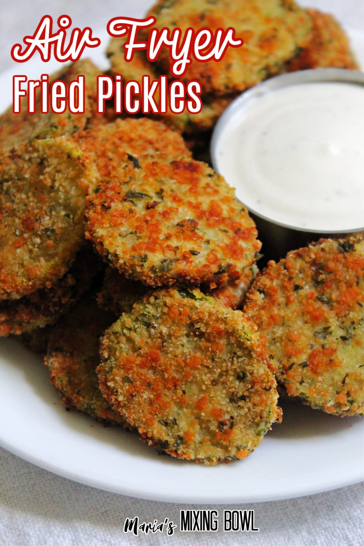 Air Fryer Fried Pickles on a white plate with a bowl of ranch