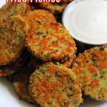 Air Fryer Fried Pickles on a white plate with a bowl of ranch
