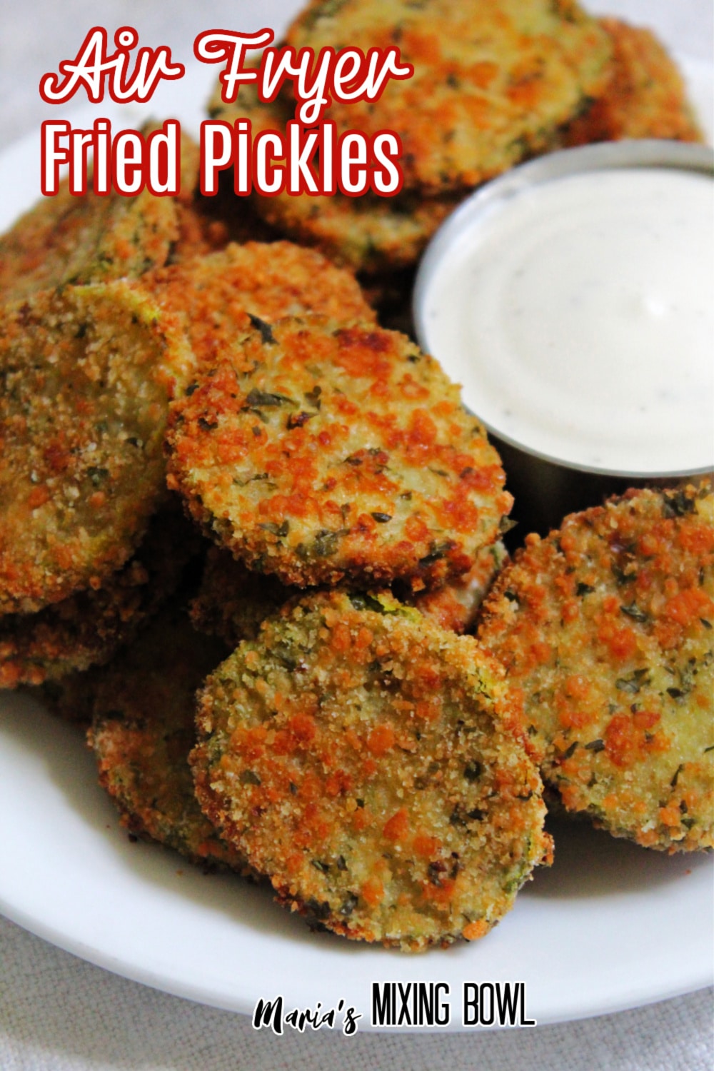 Air Fryer Fried Pickles on a white plate with a bowl of ranch