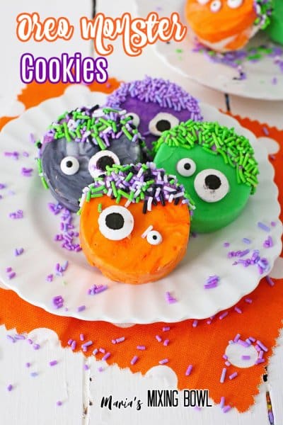 colorful oreo monster cookies on a white plate