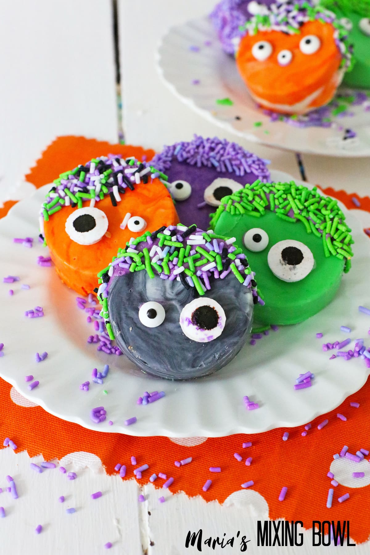 colorful Monster Oreo Cookies on a white plate