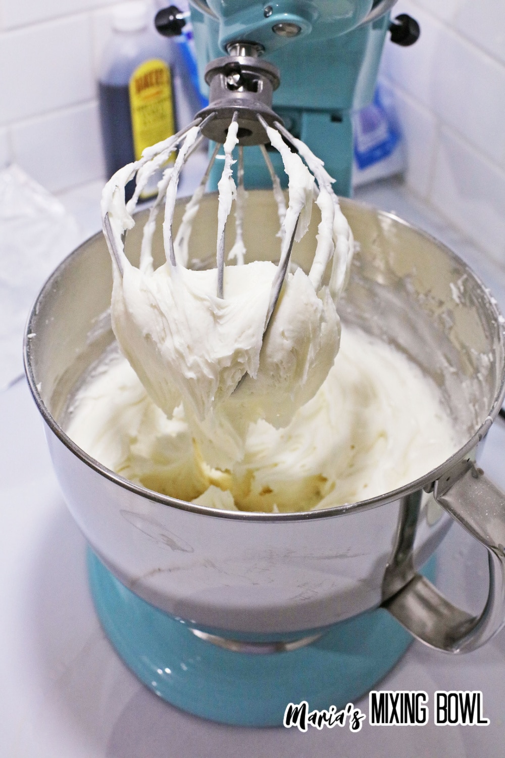 cream cheese, milk, and sugar in a stand mixer