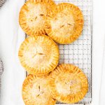 air fryer apple hand pies on a wire cooling rack