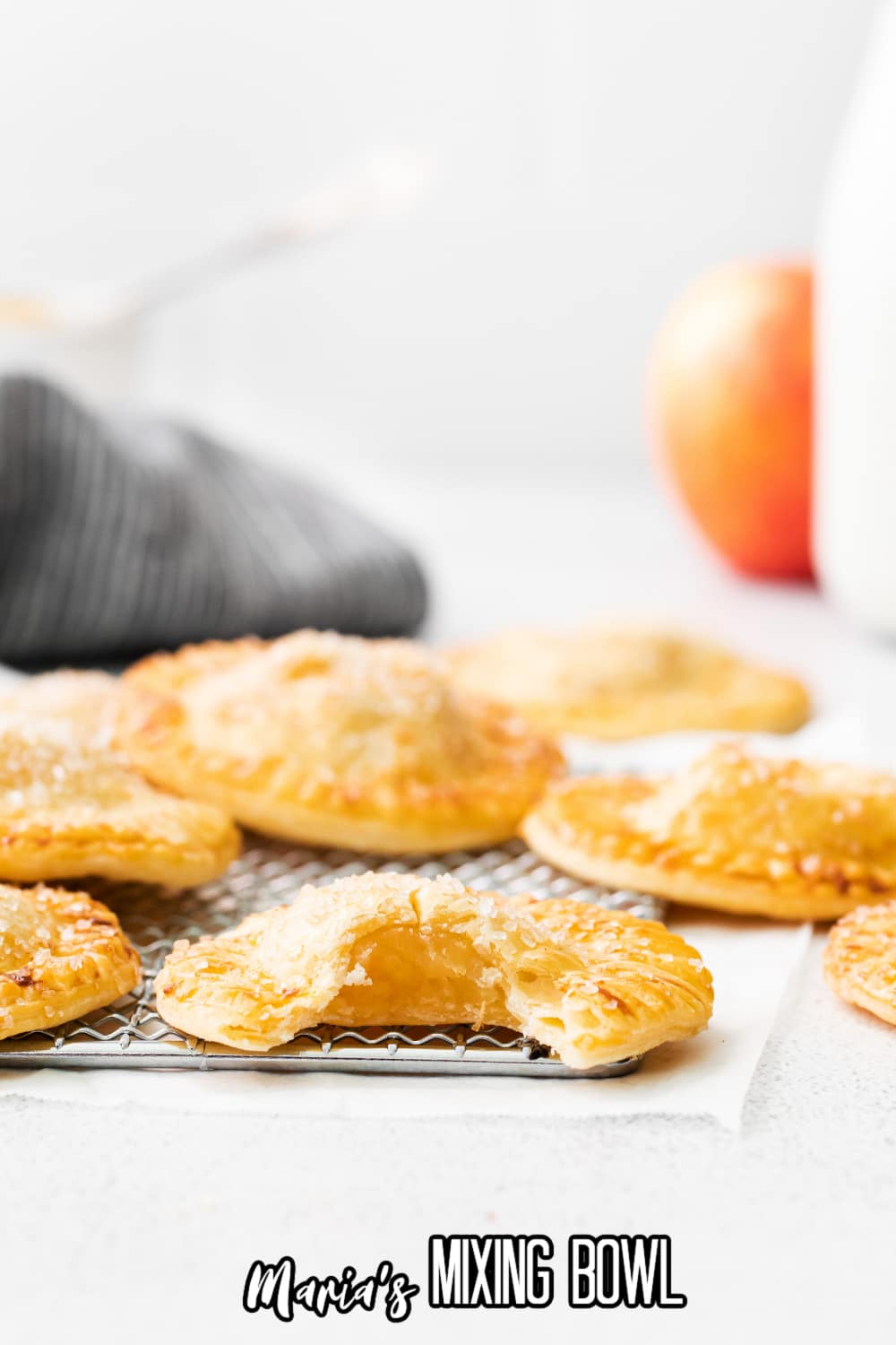 the inside of air fryer apple hand pies on a wire cooling rack