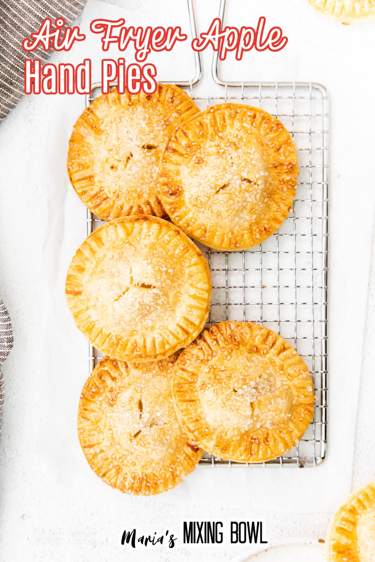 air fryer apple hand pies on a wire cooling rack