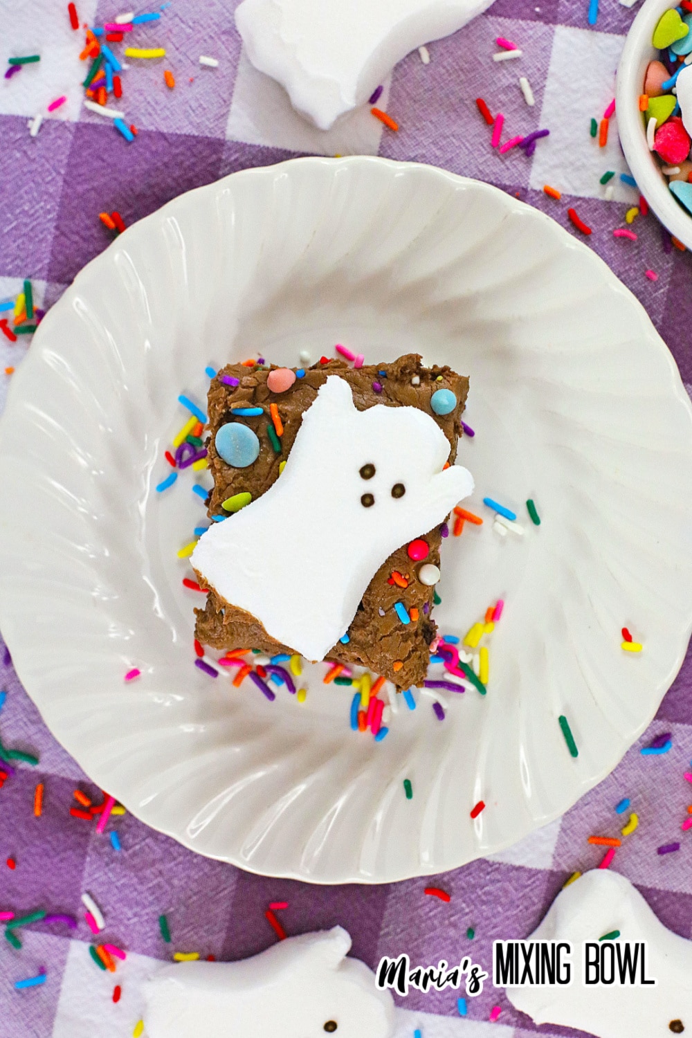 birds eye image of an air fryer ghost brownie on a white plate