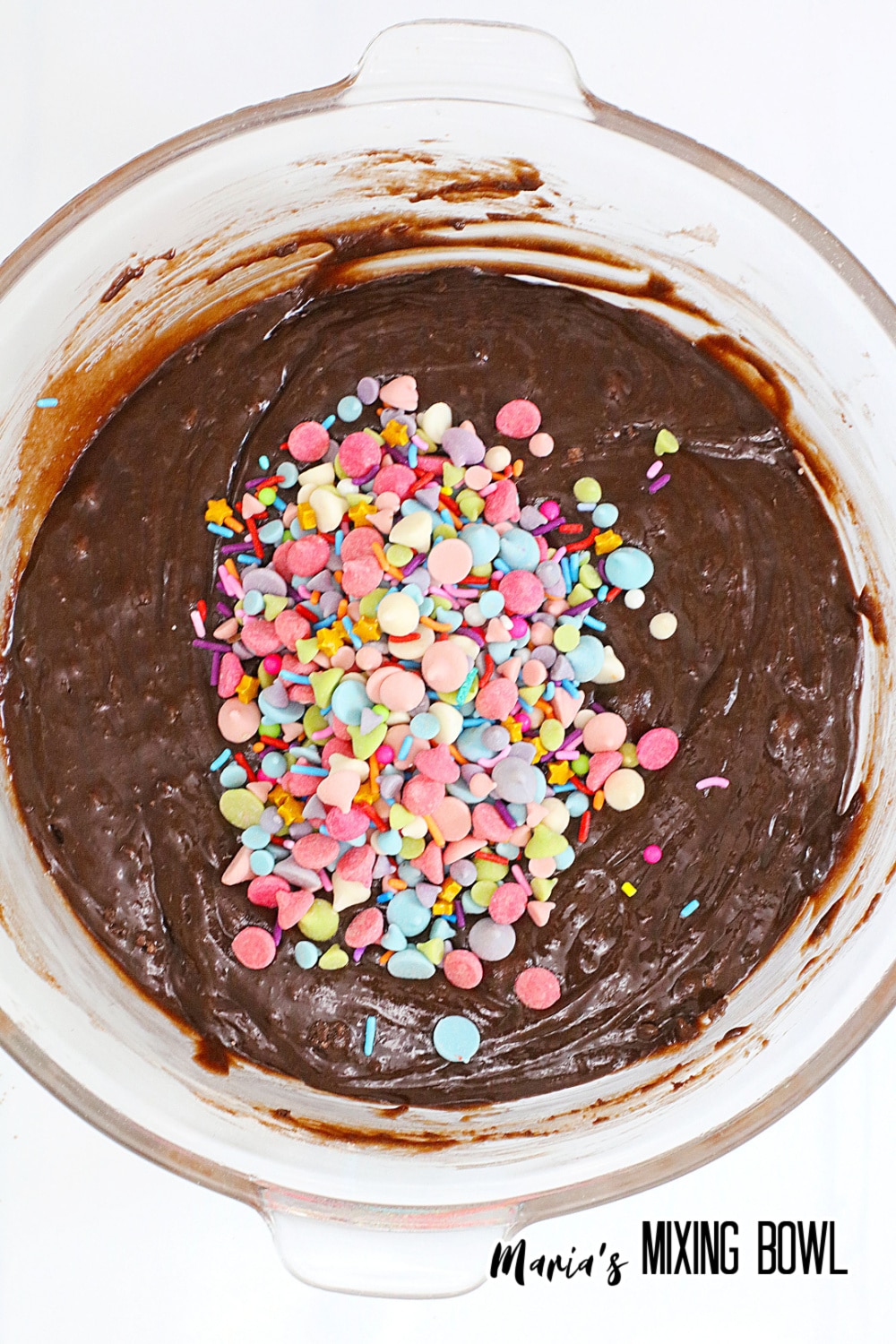 batter and sprinkles in a glass mixing bowl