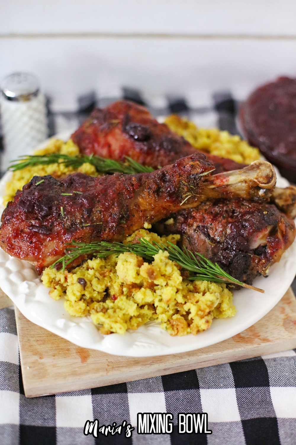 air fryer turkey legs on a bed of stuffing with the name in text