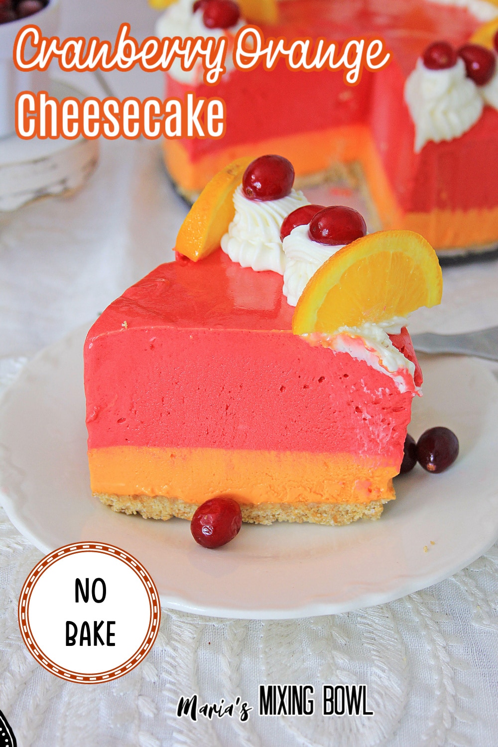 slice of cranberry orange cheesecake on a white plate