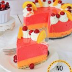slice of cranberry orange cheesecake on a white plate