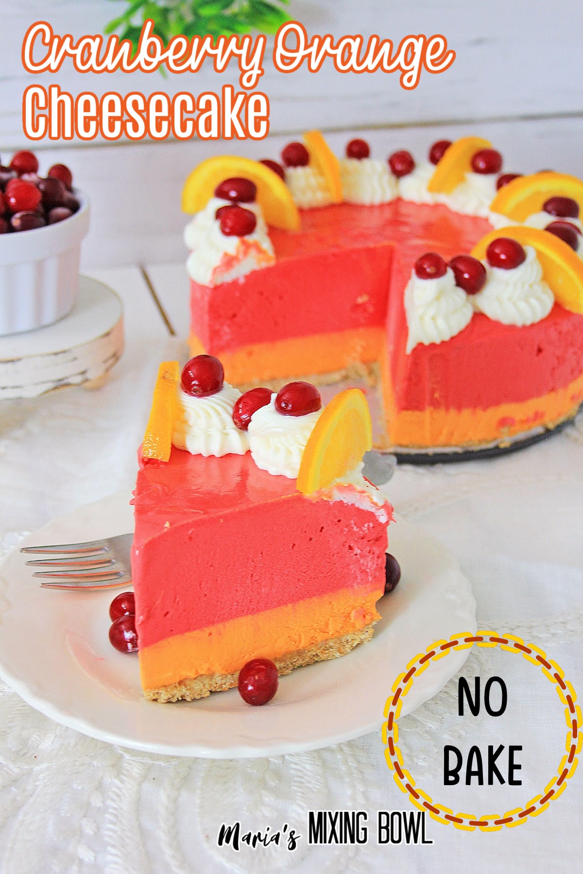 slice of cranberry orange cheesecake on a white plate