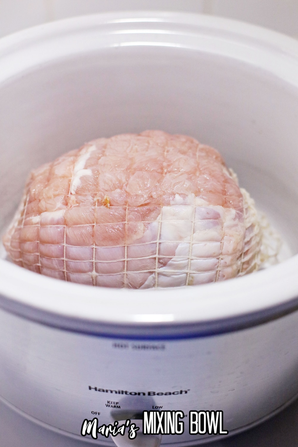 raw meat in a slow cooker