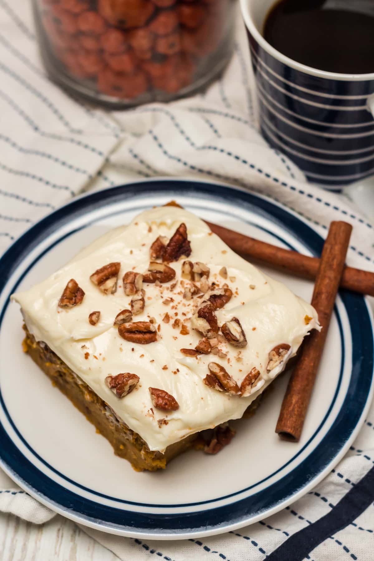 birds eye pumpkin pecan bars on a blue and white plate