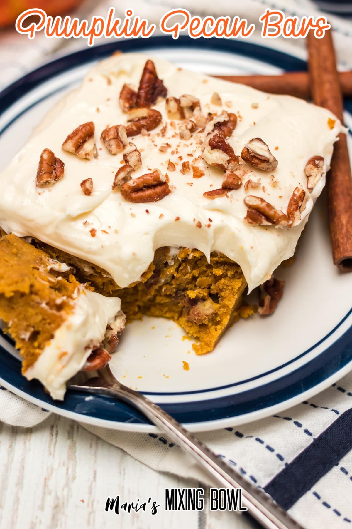 pumpkin pecan bars on a blue and white plate