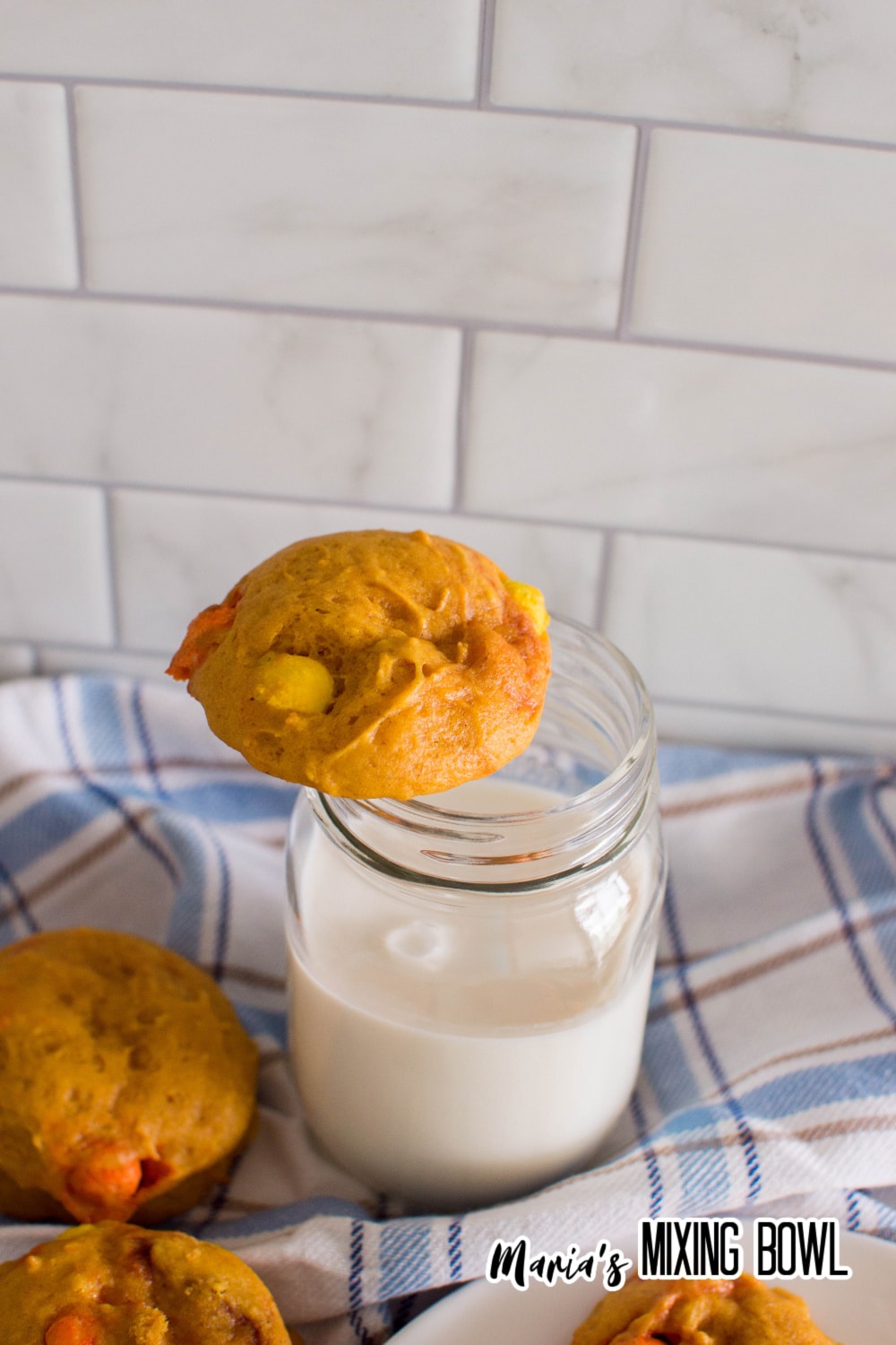 pumpkin reese's pieces cookie on a mason jar