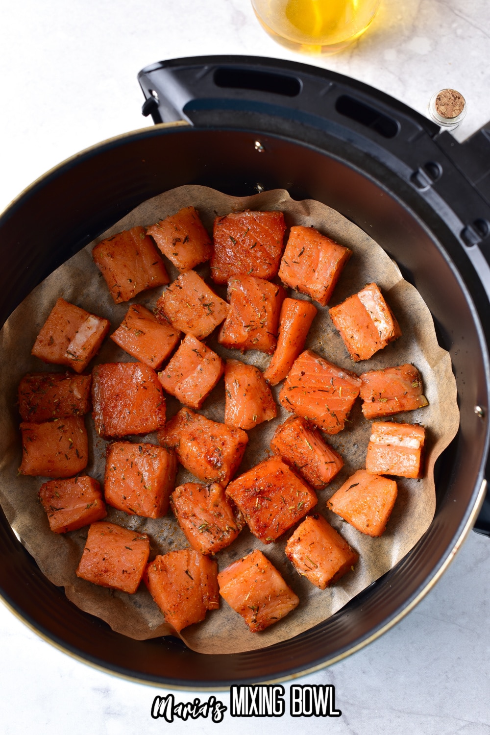 chunks of fish on parchment paper