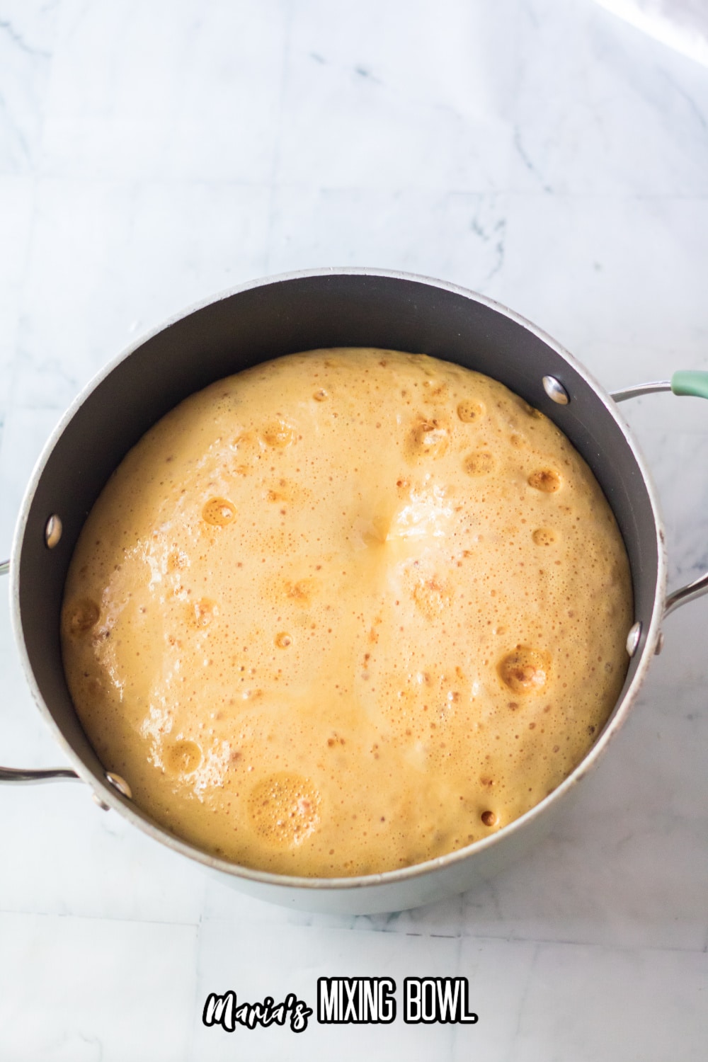 brittle being boiled in a saucepan