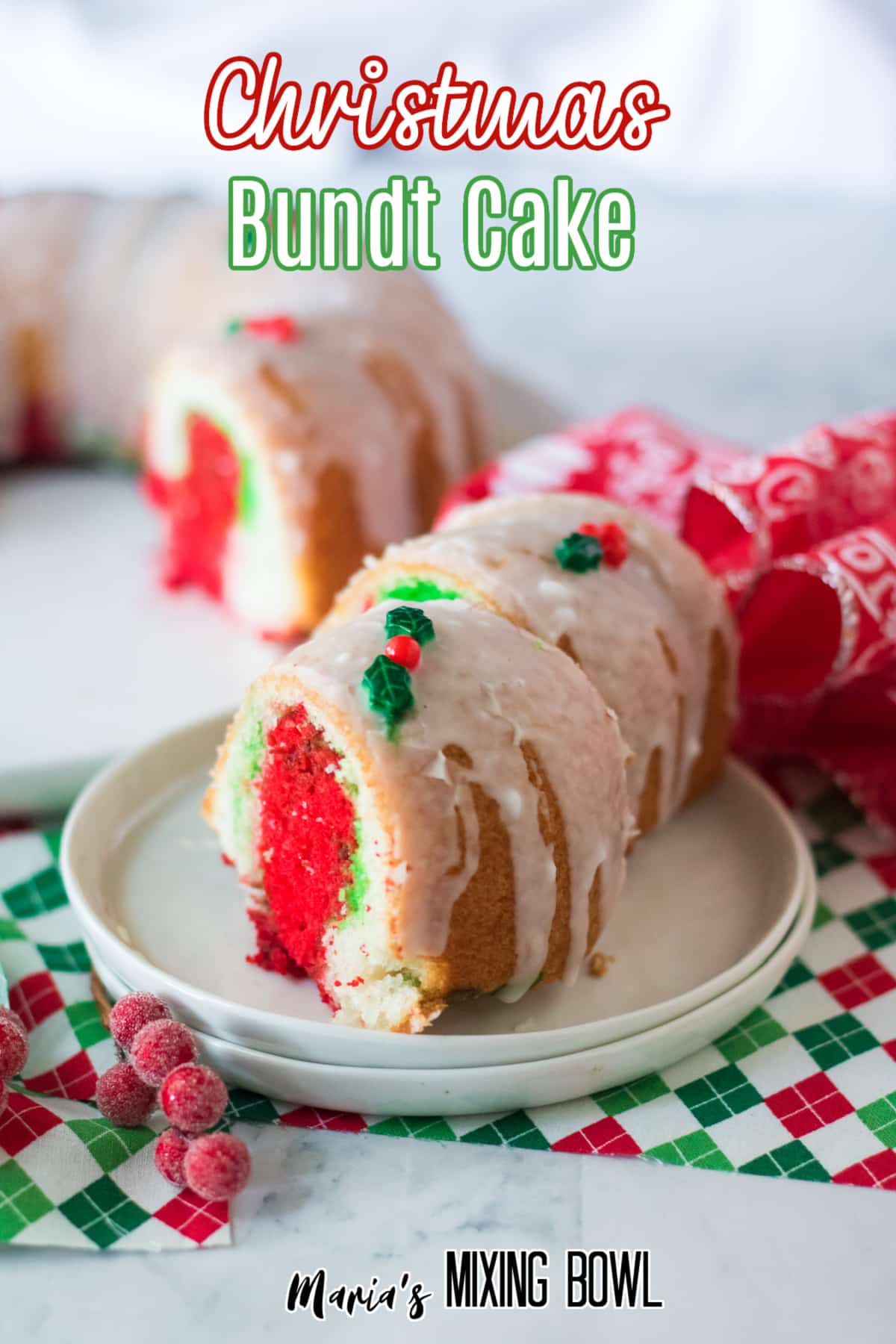 two slices of christmas bundt cake on a white plate