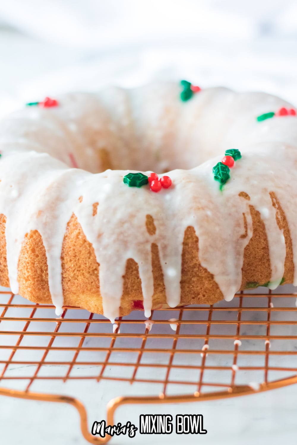 uncut christmas bundt cake on a wire cooling rack