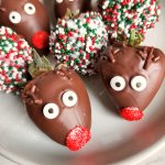 christmas chocolate covered strawberries on a white plate