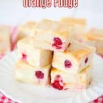 stack of cranberry orange fudge on a white plate