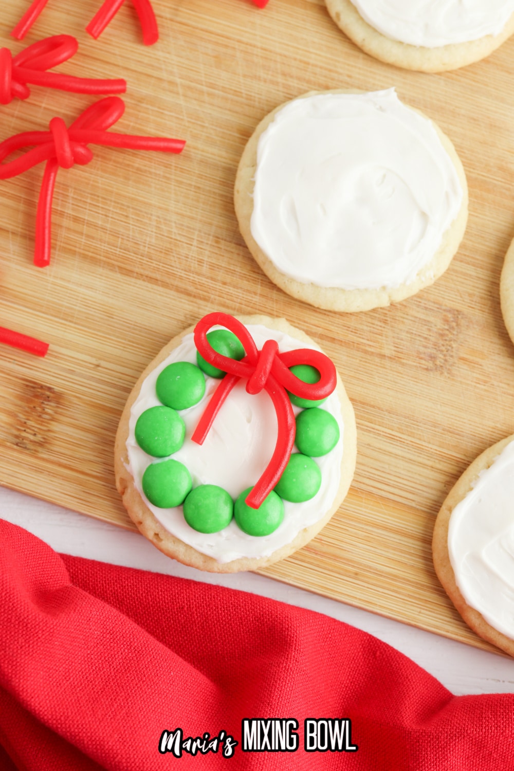 decorated cookie on a wooden cutting board