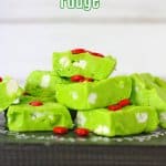 grinch fudge stacked in a pyramid on a wooden background