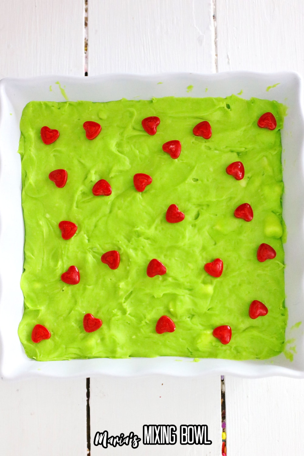 grinch fudge in a parchment lined baking sheet