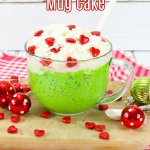 grinch mug cake on a wooden cutting board with the name in text