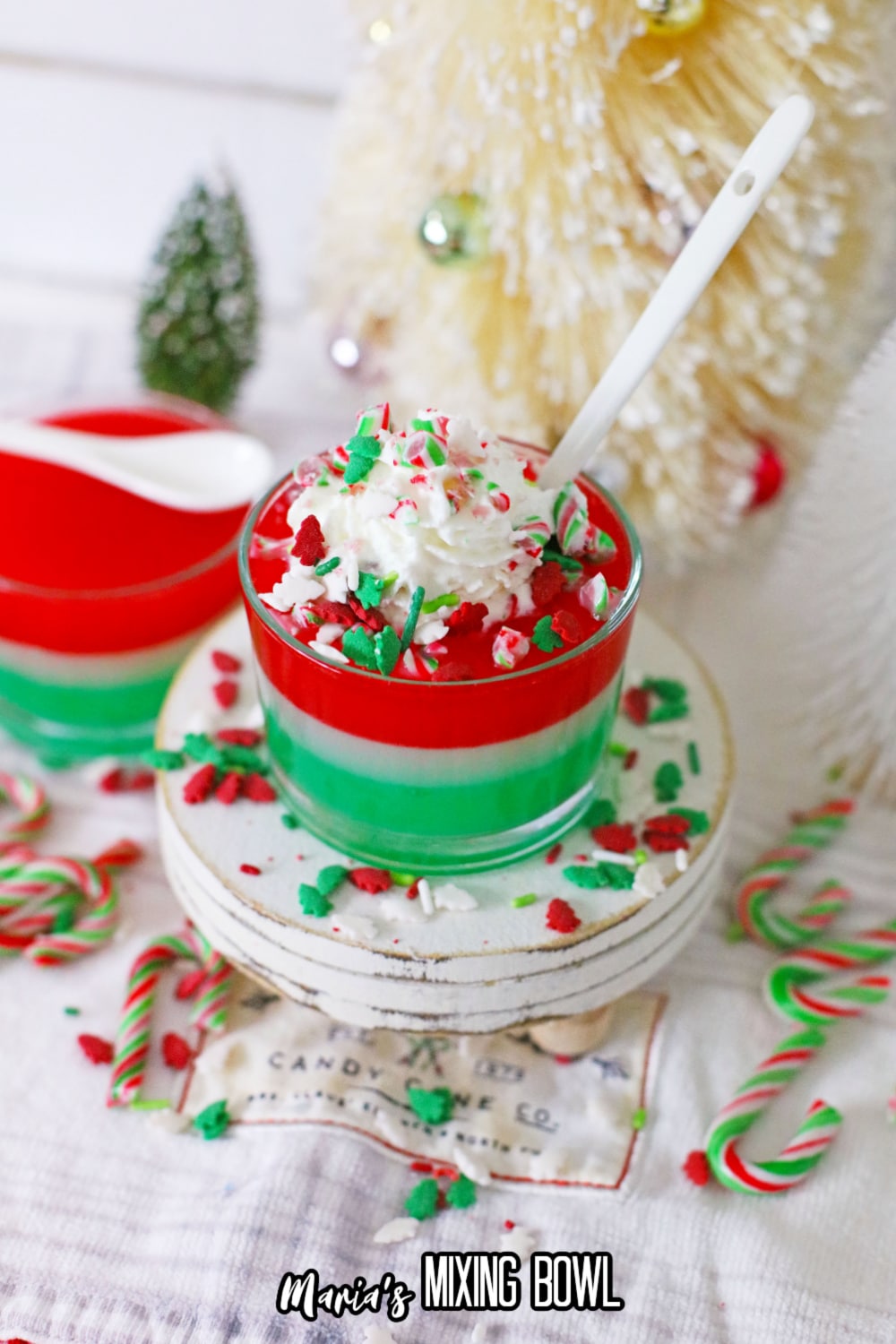 glass of christmas gelatin on a cupcake stand