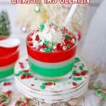 glass of christmas gelatin on a cupcake stand