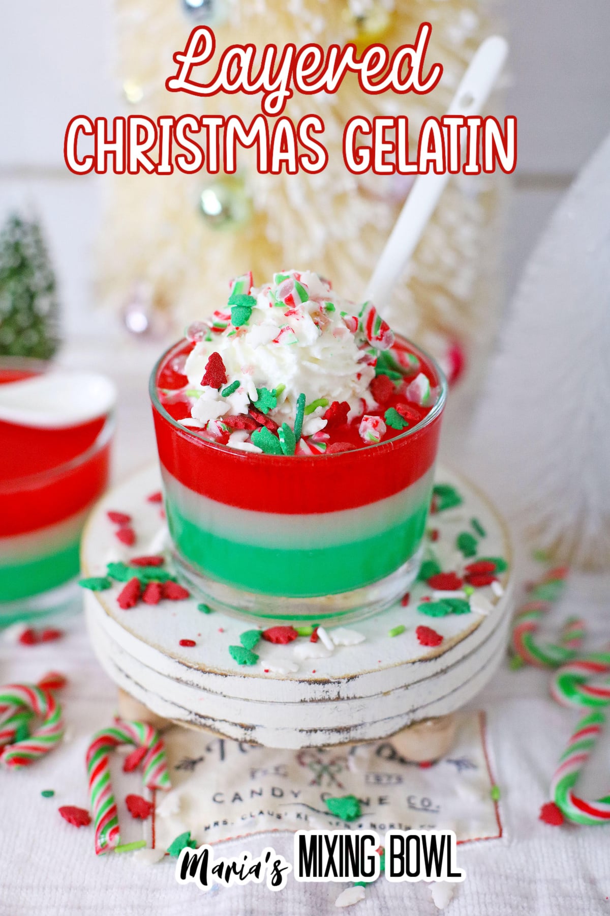 glass of christmas gelatin on a cupcake stand