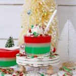 glass of christmas gelatin on a cupcake stand
