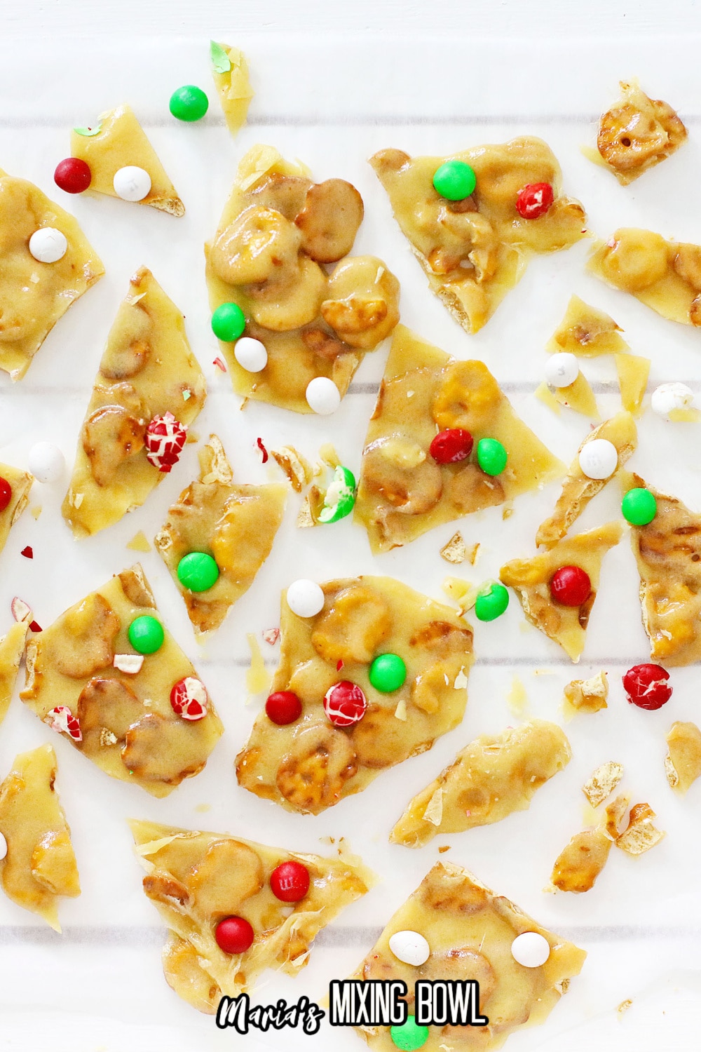 broken pieces of dessert on parchment paper