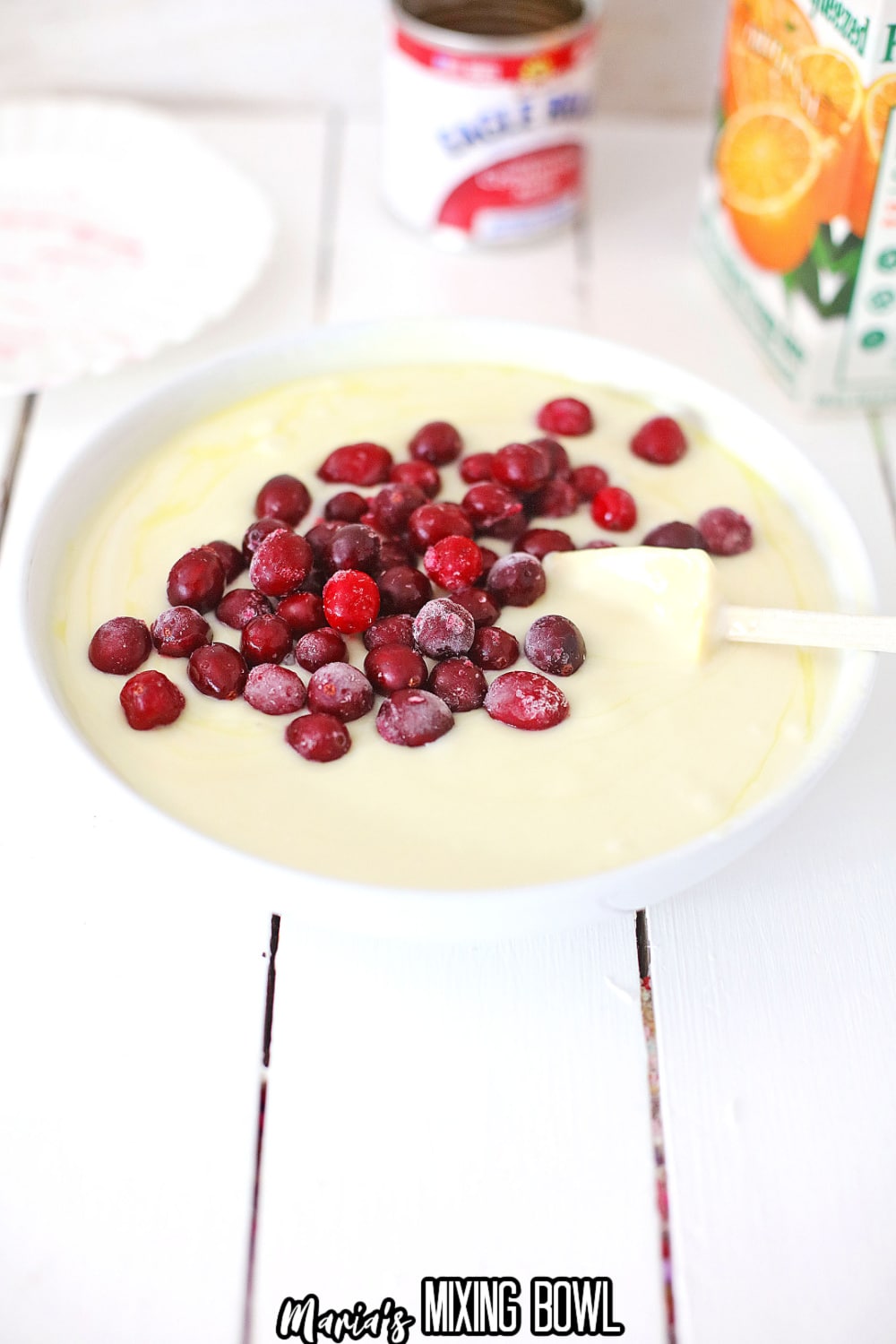 fruit being added to white chocolate