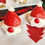 two snata gnome cookie cups on a christmas napkin